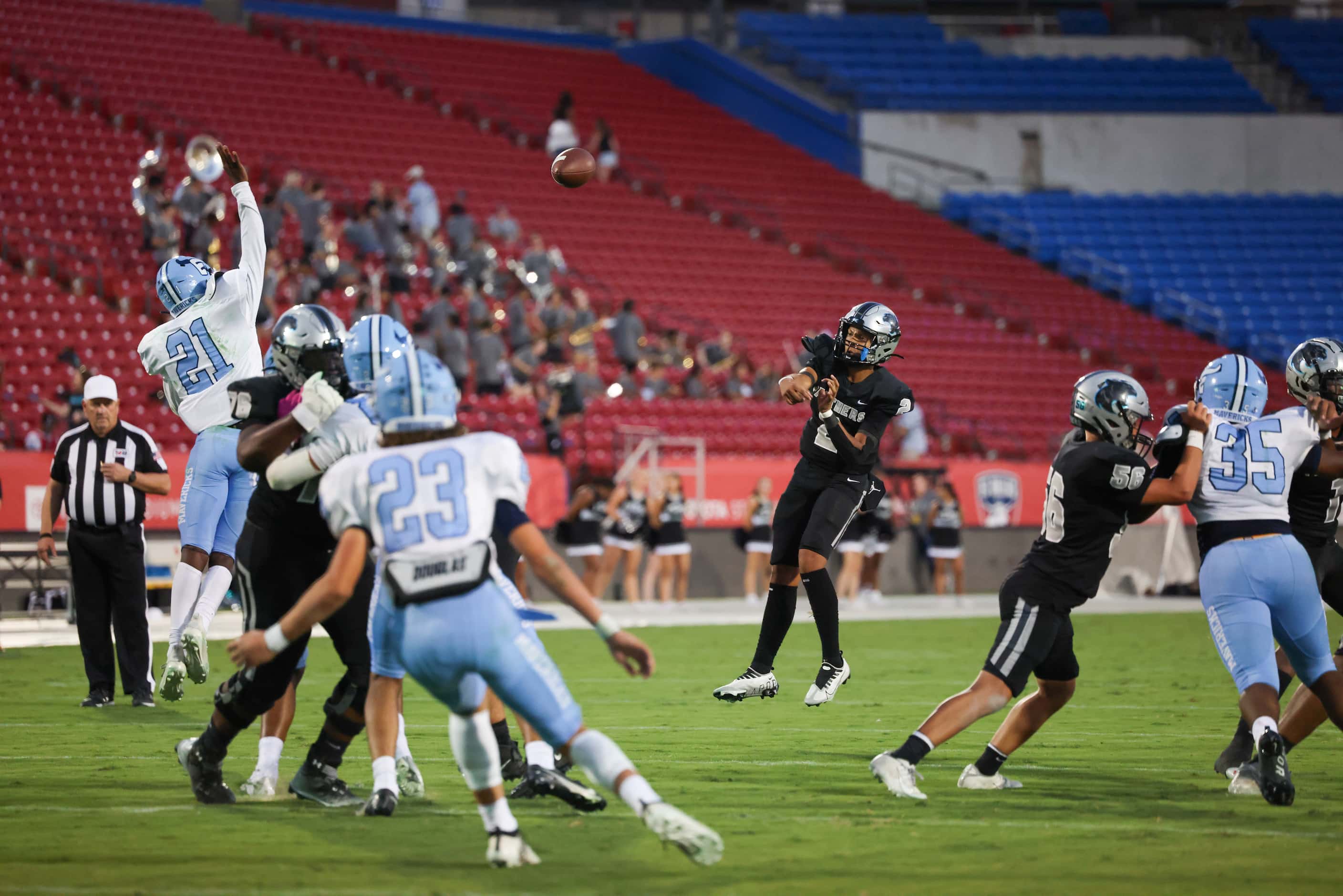 Panther Creek Panthers quarterback Michael Adams (2) releases a pass into the end zone in...