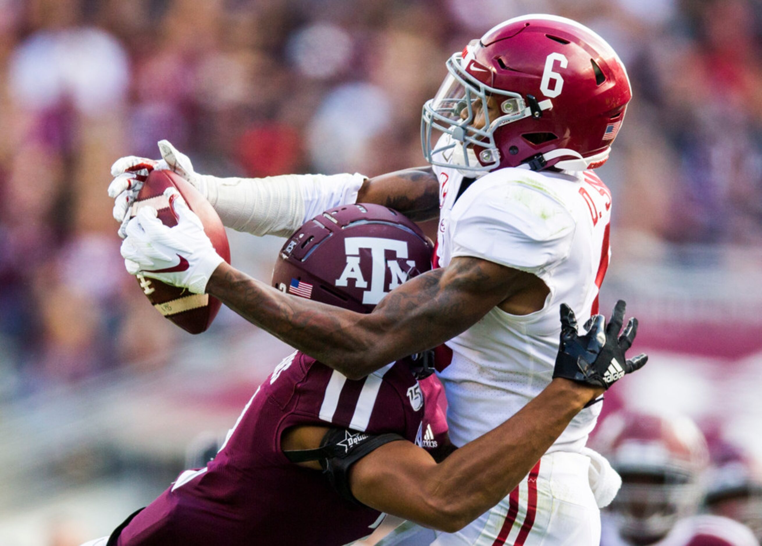 Texas A&M Aggies defensive back Elijah Blades (2) prevents a catch by Alabama Crimson Tide...