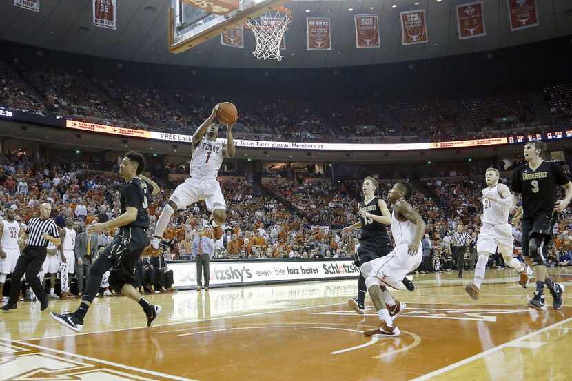 zAUSTIN, TX - JANUARY 30: Isaiah Taylor #1 of the Texas Longhorns leaps to the basket...