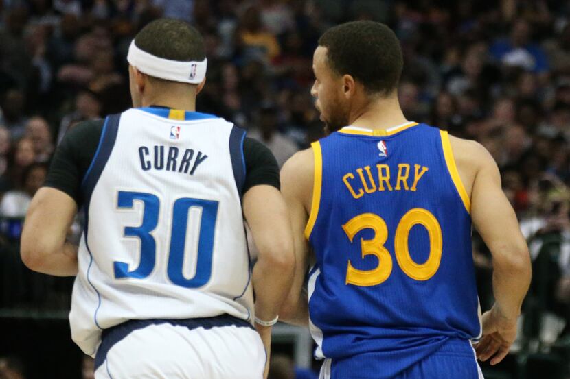 Dallas Mavericks guard Seth Curry (30) and Golden State Warriors guard Stephen Curry (30)...
