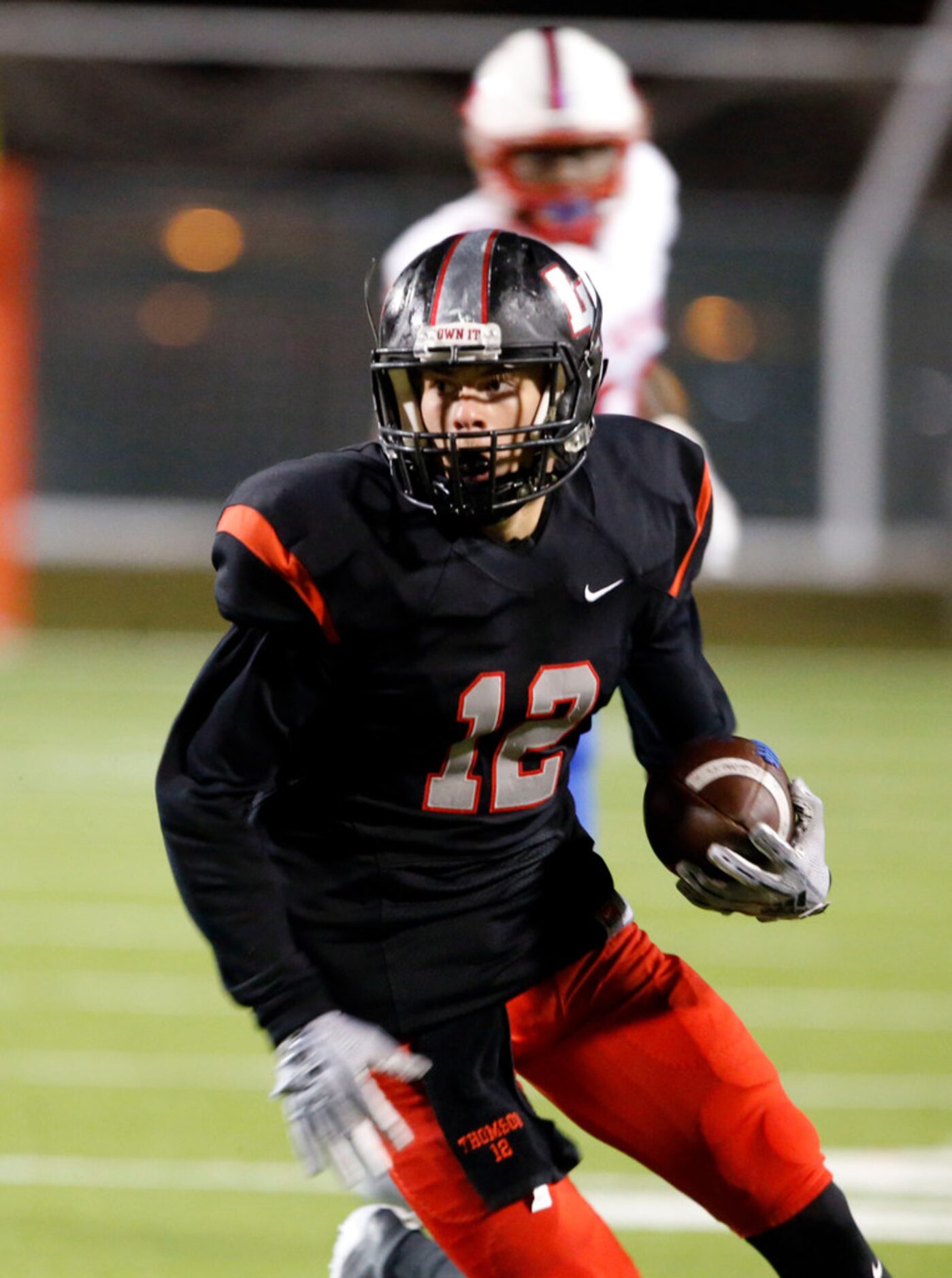 Lake Highlands defender Jacob Thomson (12) returns an interception for a touchdown during...