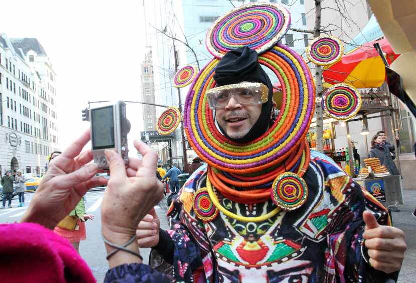 Davey Mitchell poses for photographs as he takes part in the Easter Parade along New York's...