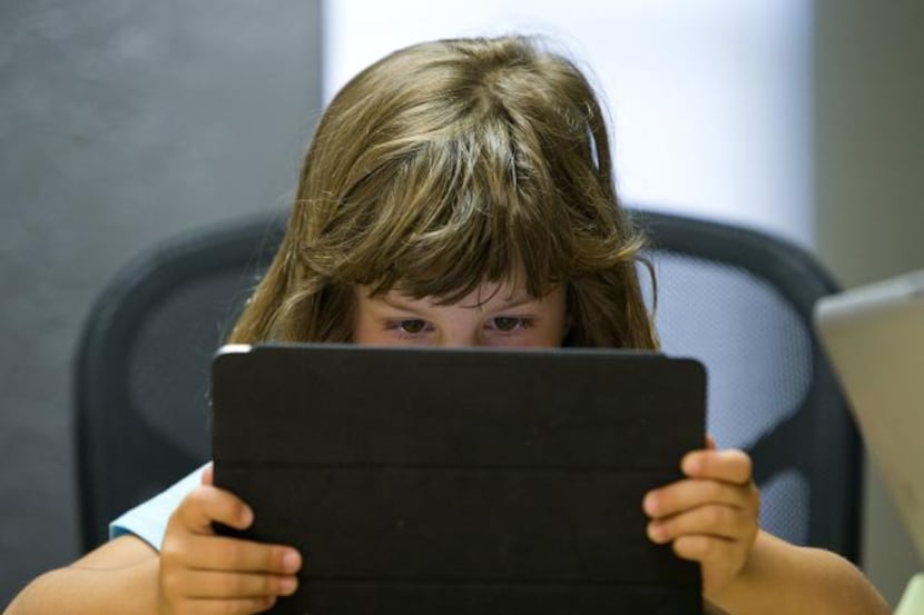 
Anna Heath, 5, tests Kidaptive’s Leo’s Pad app at the Kidaptive office in Palo Alto, Calif....