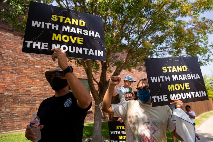 Protesters rally outside the home of Dallas City Manager T.C.​ Broadnax, calling on him and...