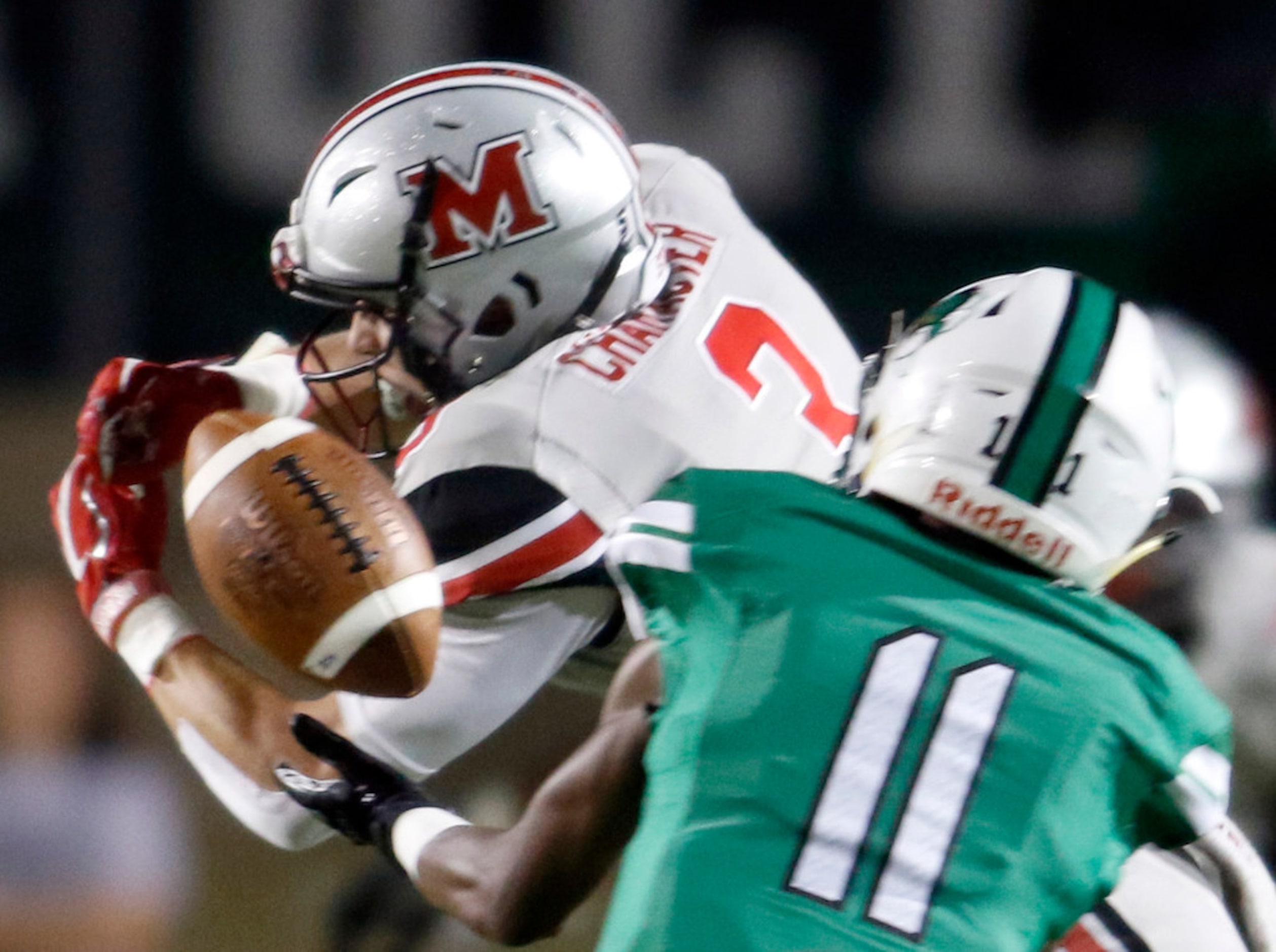 Flower Mound Marcus defensive back Clayton Rutz (3) breaks up a pass  deep into the...