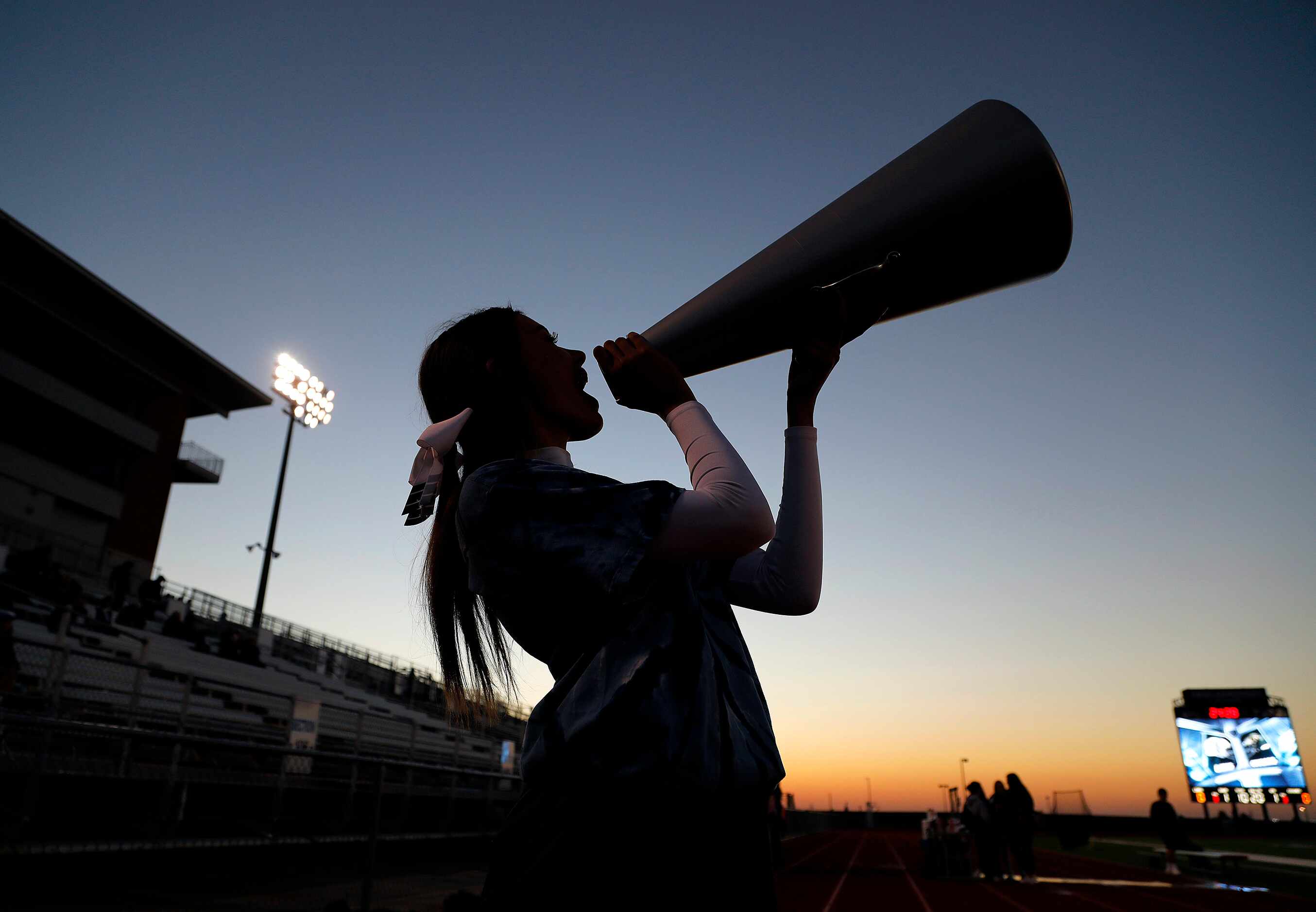 Ana Barros, 17, a cheerleader for Reedy High School, shows spirit during the first half as...