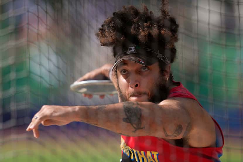 Joseph Brown competes in the men's discus throw final during the U.S. Track and Field...