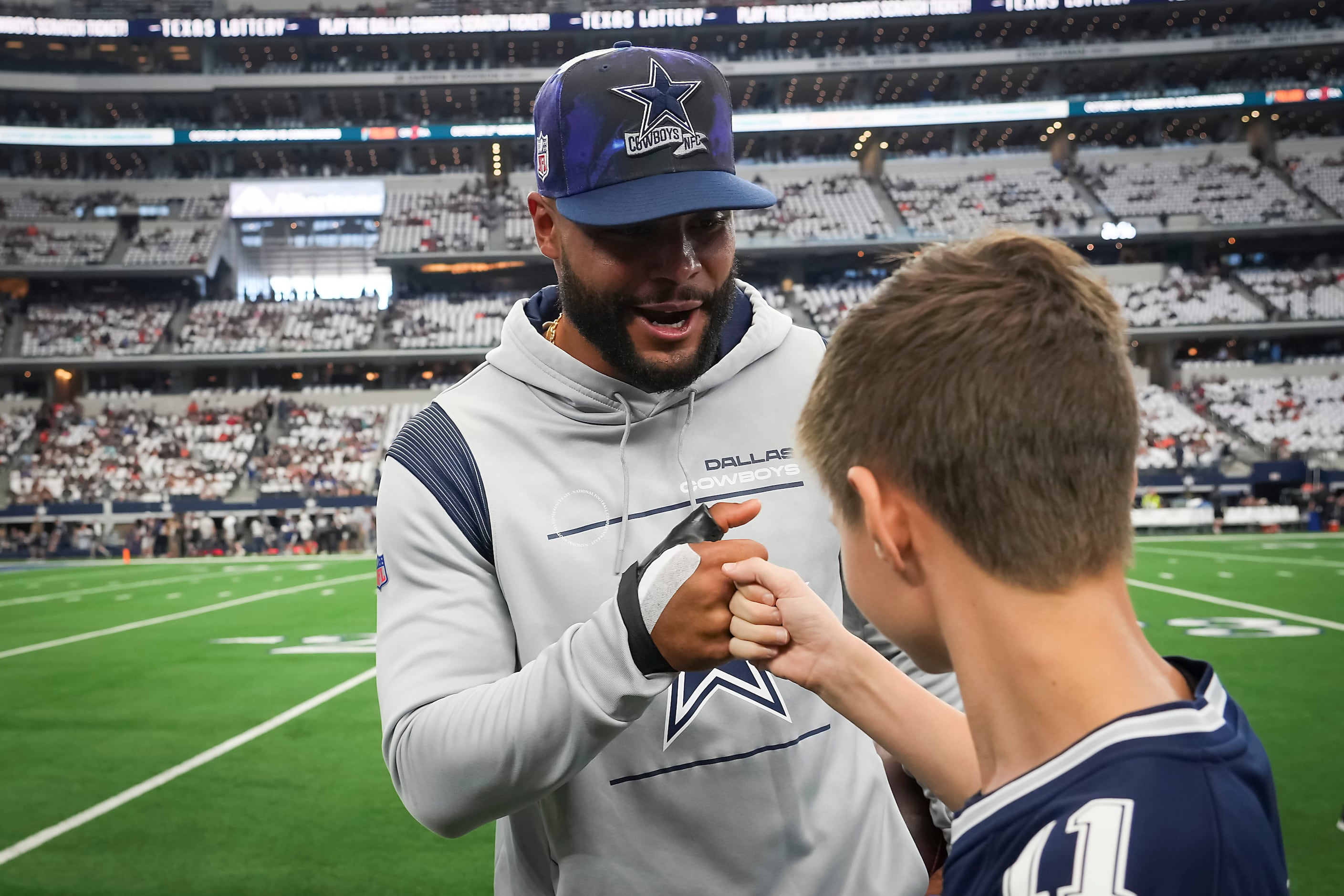 Dallas Cowboys quarterback Dak Prescott (4) looks to pass during a  Thanksgiving day NFL football game against the Las Vegas Raiders, Thursday,  Nov. 25, 2021, in Arlington, Texas. (AP Photo/Matt Patterson Stock