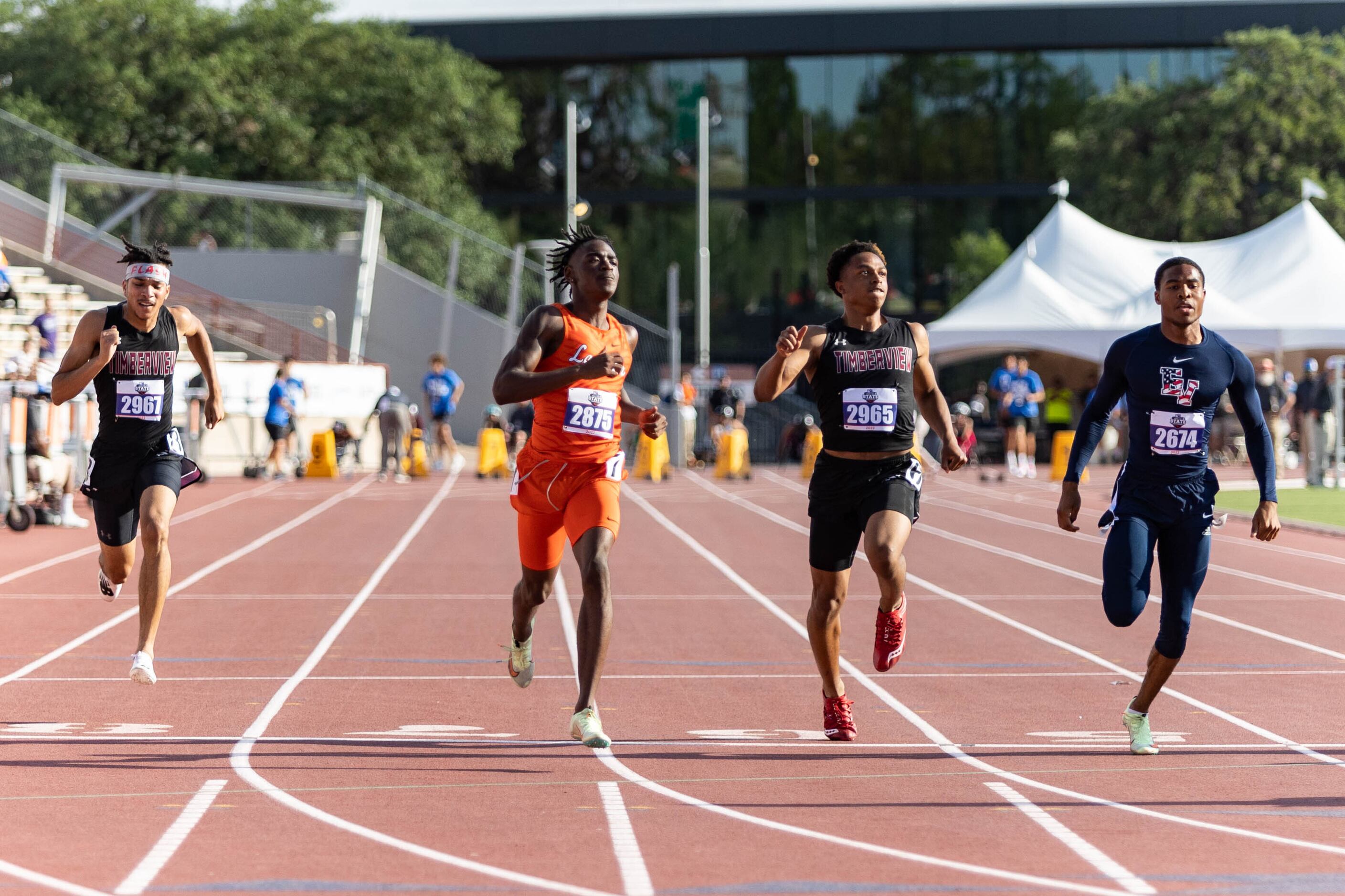 Lancaster’s Kordarion Smith, second from the left, and Mansfield Timberview’s Jordan...