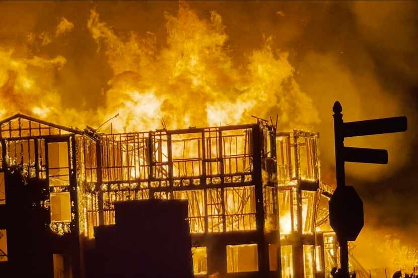 An apartment complex under construction is engulfed in flames on Tuesday, Aug. 30, 2022, Fate.