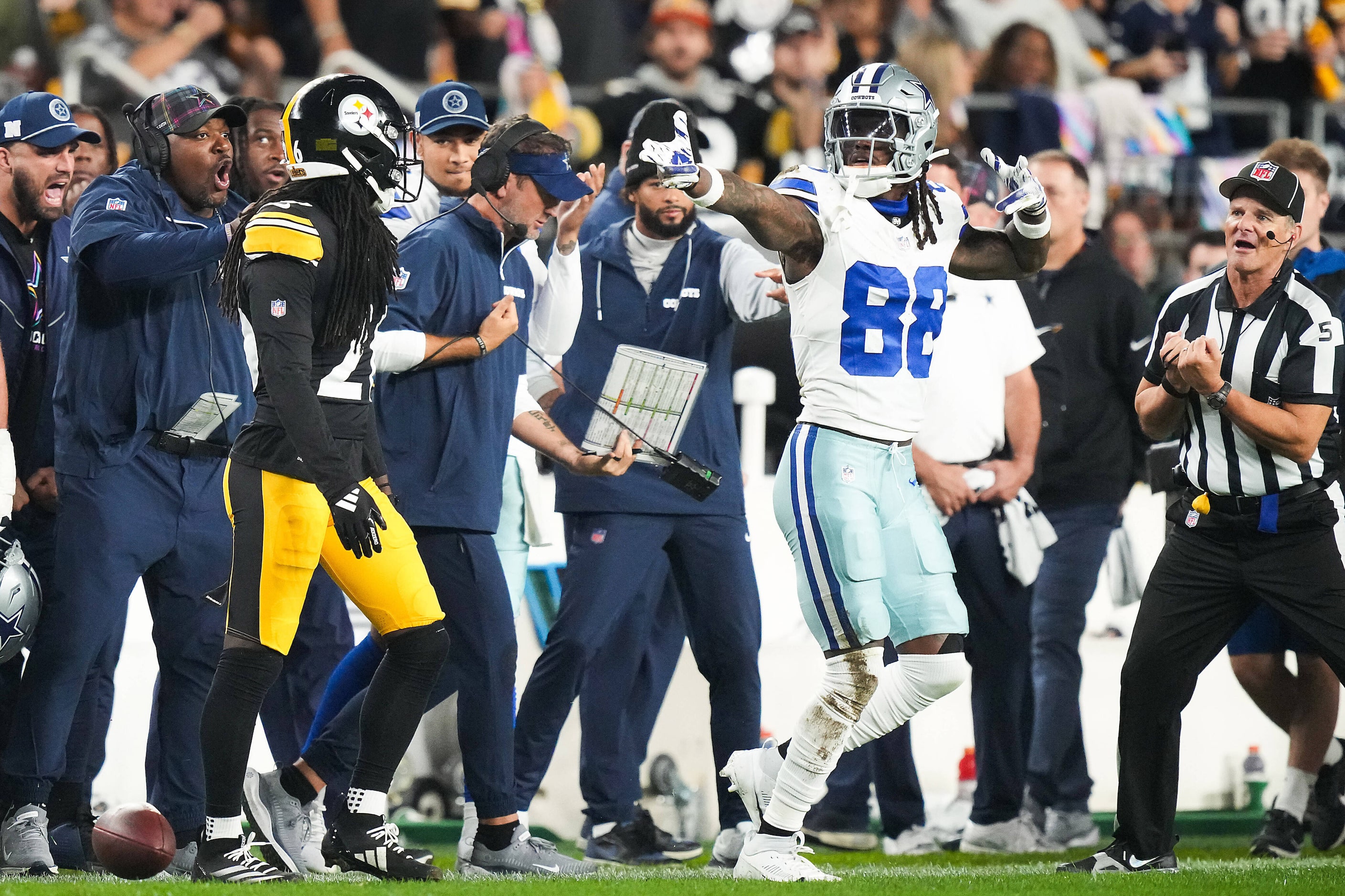 Dallas Cowboys wide receiver CeeDee Lamb (88) celebrates after picking up a first down...