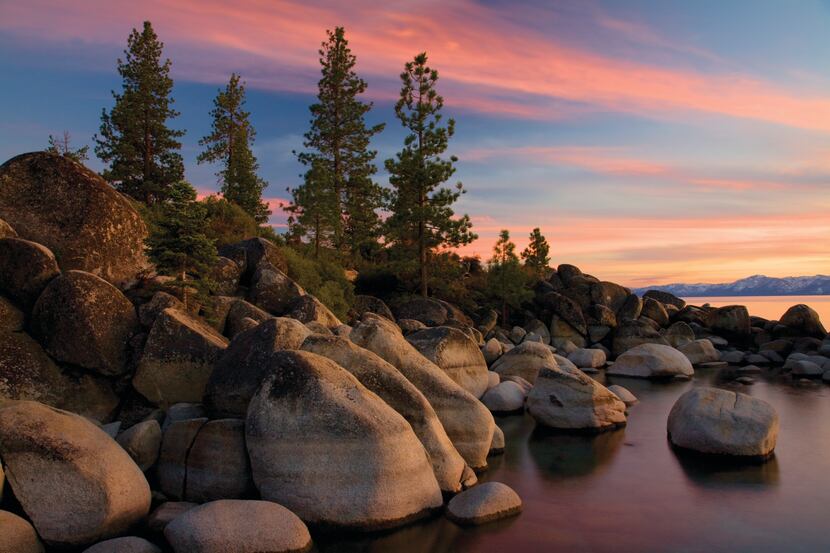 Rocky shoreline at sunset, Sand Harbor State Park, Lake Tahoe, Nevada.