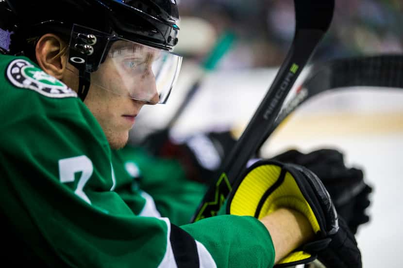 Dallas Stars defenseman John Klingberg (3) watches from the bench during the third period of...