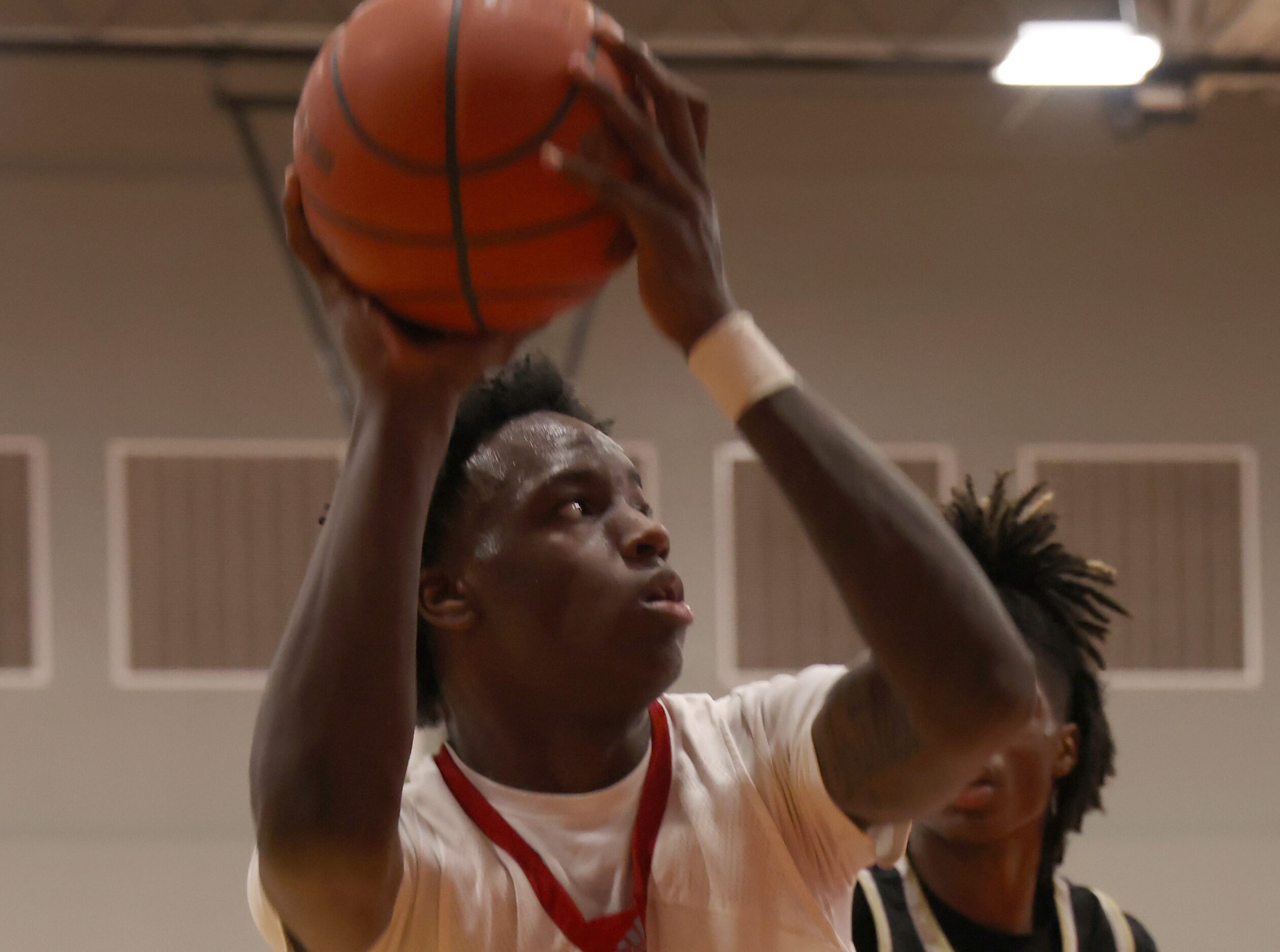 Dallas Carter wing Chance Puryear (5) eyes the basket during first half action against...