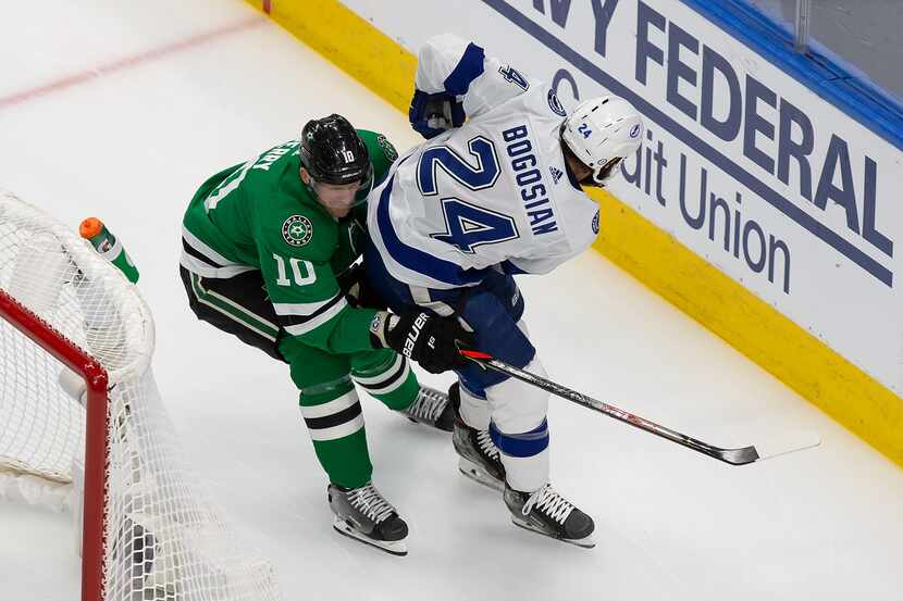 Corey Perry (10) of the Dallas Stars battles against Zach Bogosian (24) of the Tampa Bay...