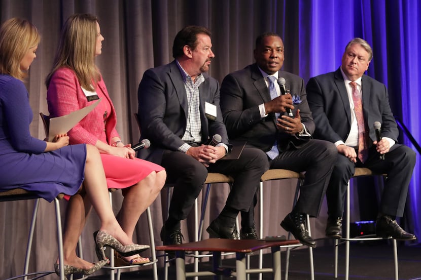 Plano Mayor Harry LaRosiliere (second from the right) speaks as part of a panel during the...