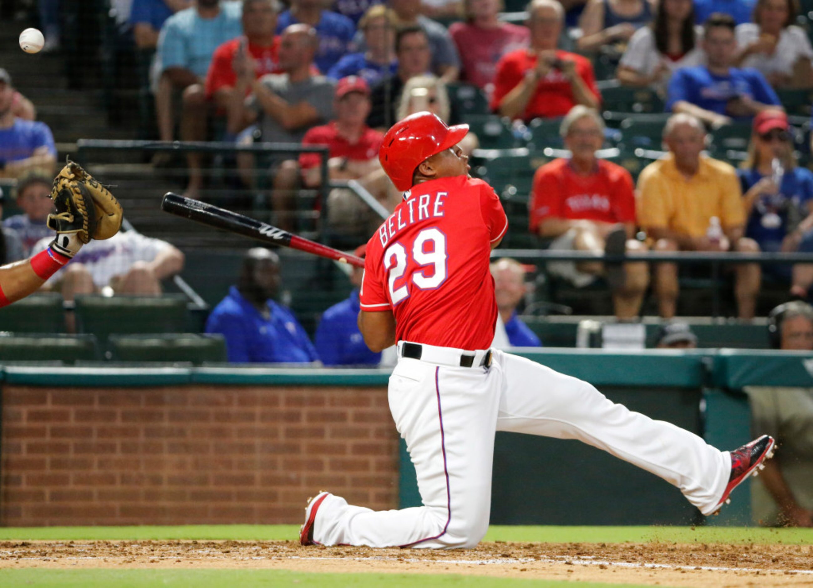 Texas Rangers third baseman Adrian Beltre (29) takes a hearty swing in the second inning...