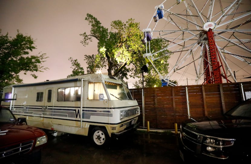The ride at next-door Ferris Wheelers overlooks Jade Spa, and the camper where police found...