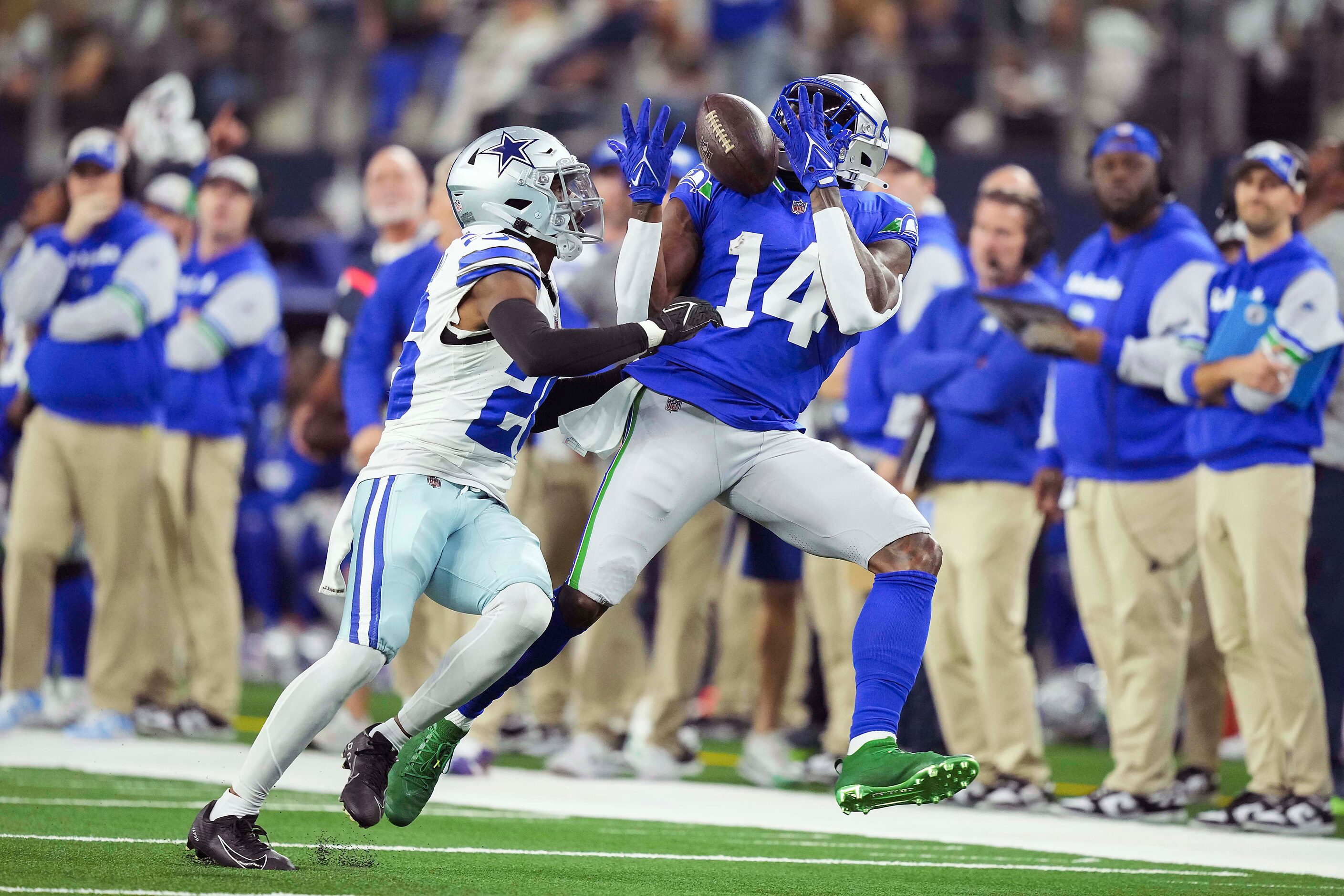 Seattle Seahawks wide receiver DK Metcalf (14) catches a pass as Dallas Cowboys cornerback...