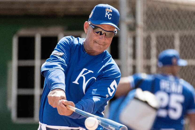 Kansas City Royals Hall of Fame player George Brett helps out during a spring training...