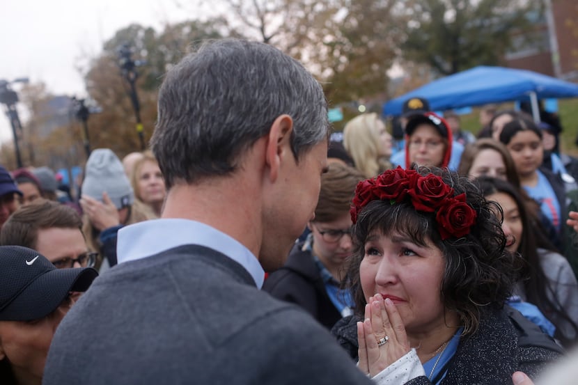 Democratic presidential candidate and former Rep. Beto O'Rourke speaks to a supporter after...