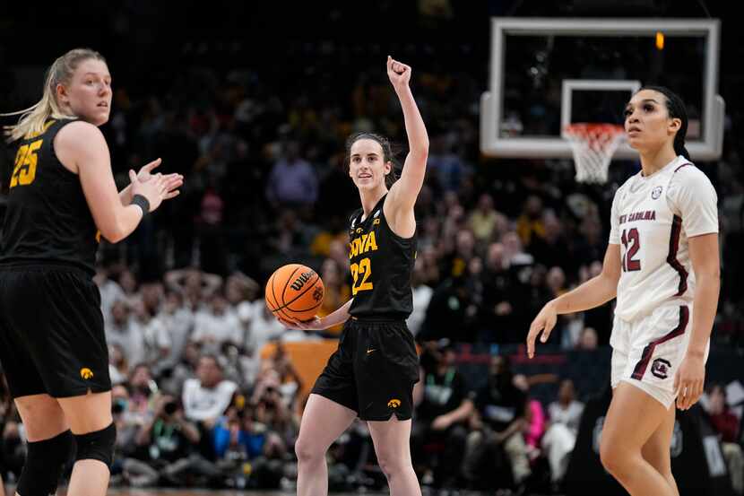 Iowa's Caitlin Clark reacts after being fouled in the final second of the second half of an...