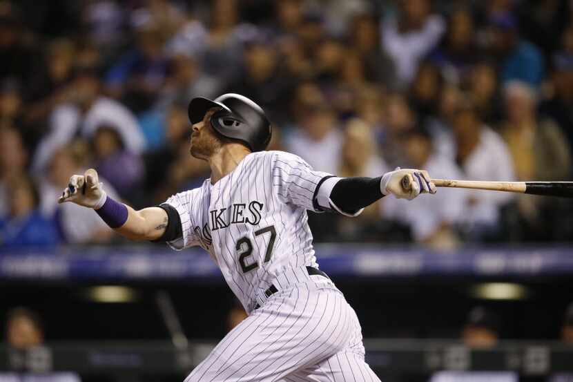 Colorado Rockies' Trevor Story flies out against the San Diego Padres in the fifth inning of...
