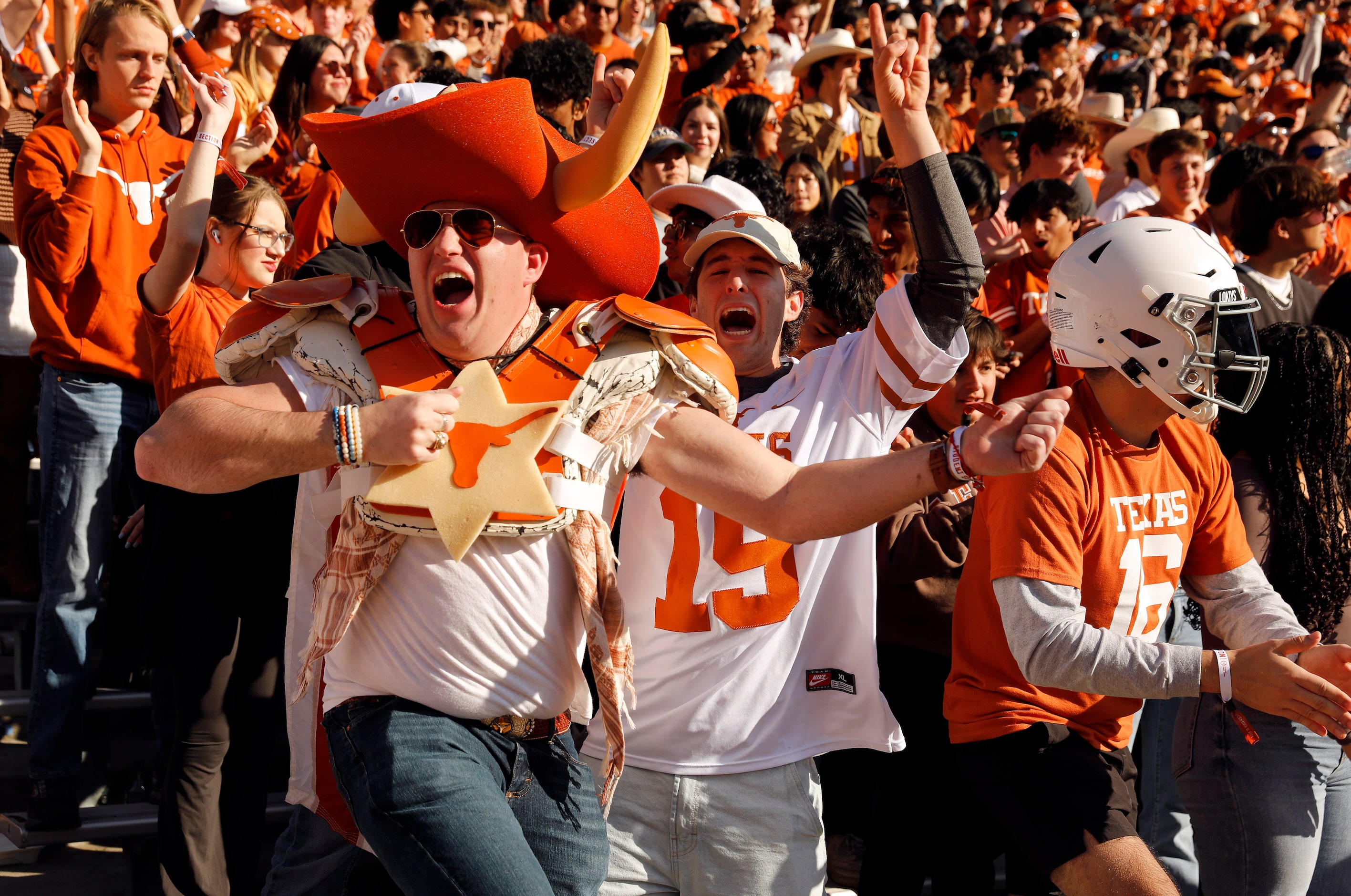 Texas Longhorns students dance to the music before the CFP first round playoff game against...