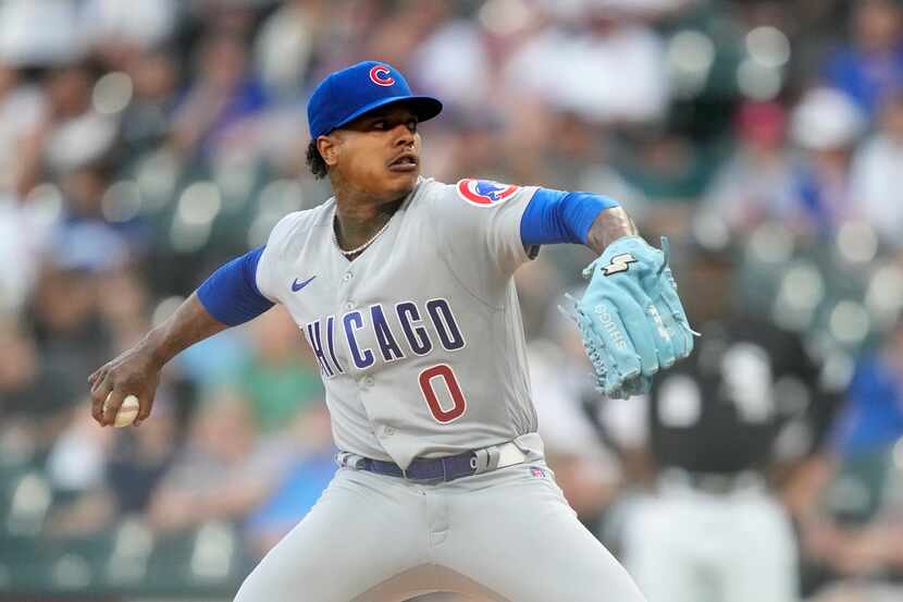 Chicago Cubs starting pitcher Marcus Stroman delivers during the first inning of the team's...
