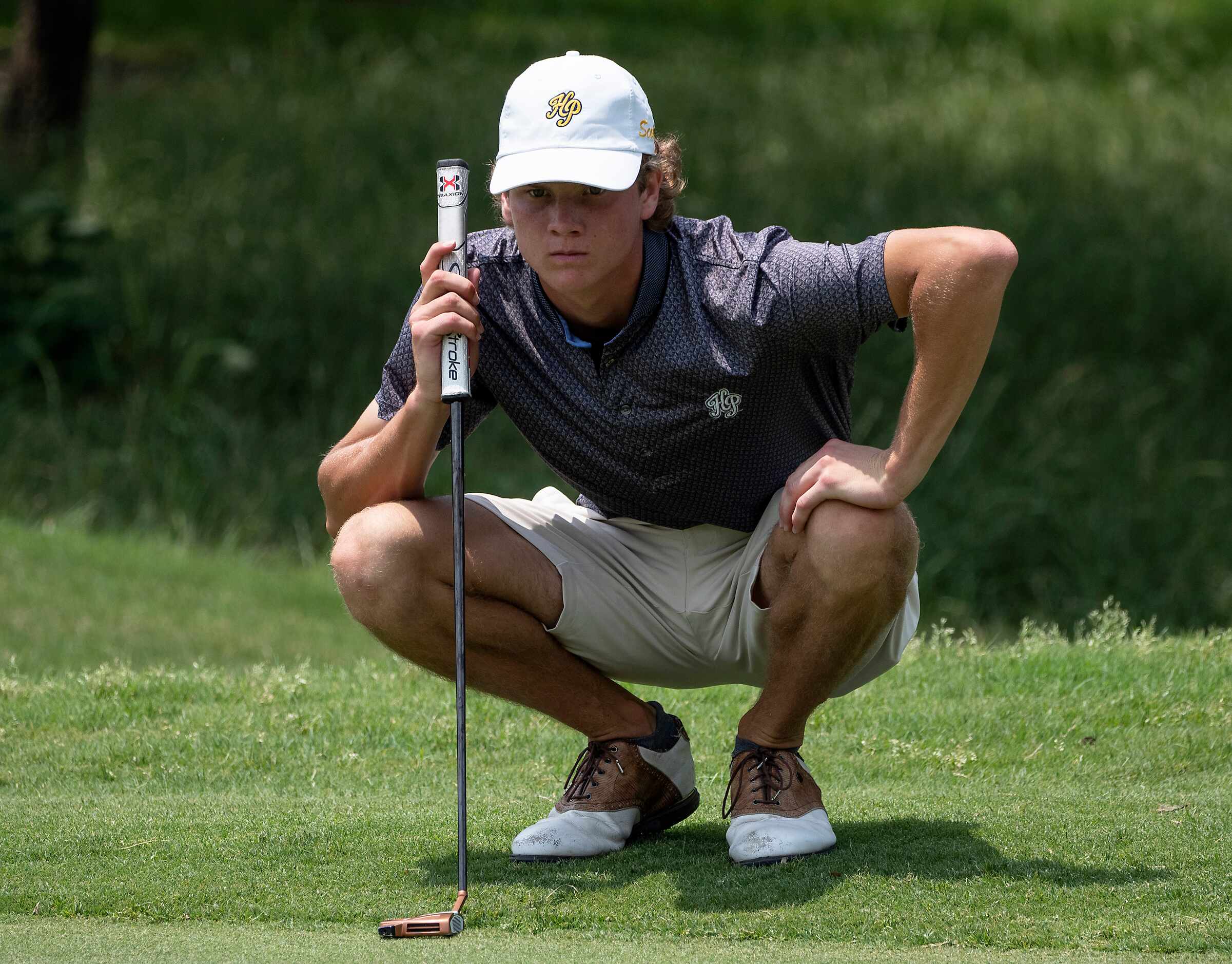 Highland Park, Martin Kemp reads the green on the no. 14 hole during the first round of UIL...