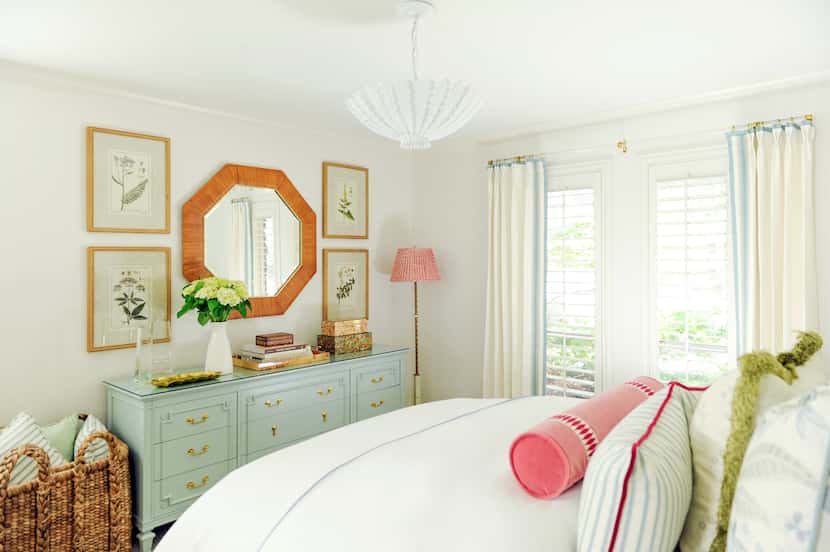 Crisp white bedding and custom throw pillows in fun patterns can become the focal point of a...