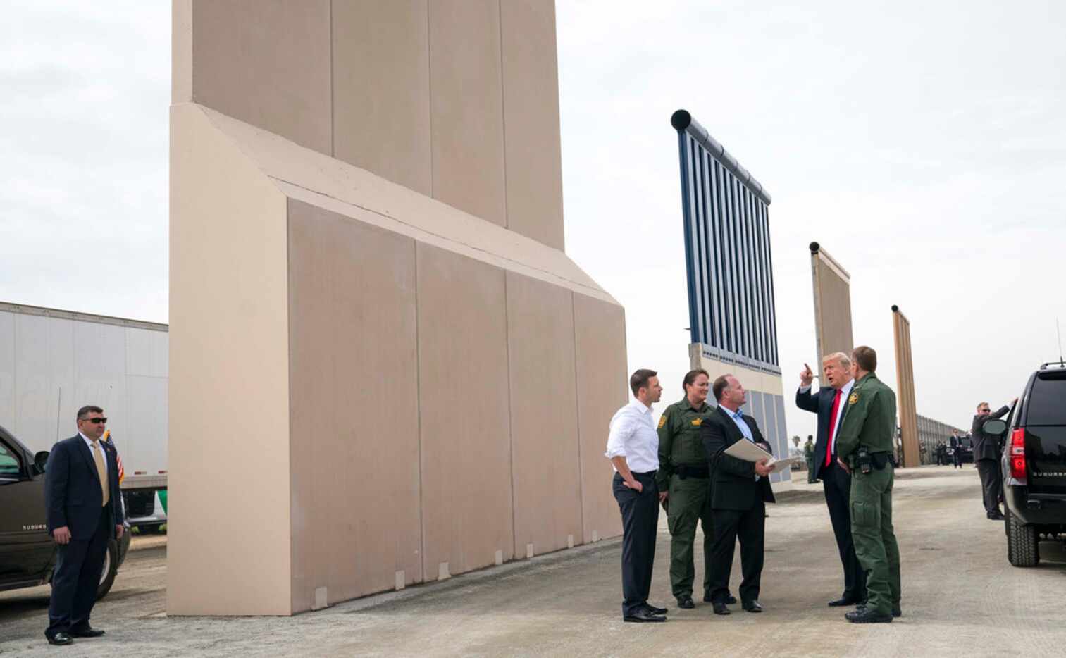 President Donald Trump views prototypes of border walls in San Diego, March 13, 2018. In one...
