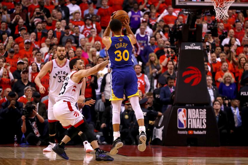 TORONTO, ONTARIO - JUNE 10:  Stephen Curry #30 of the Golden State Warriors attempts a shot...