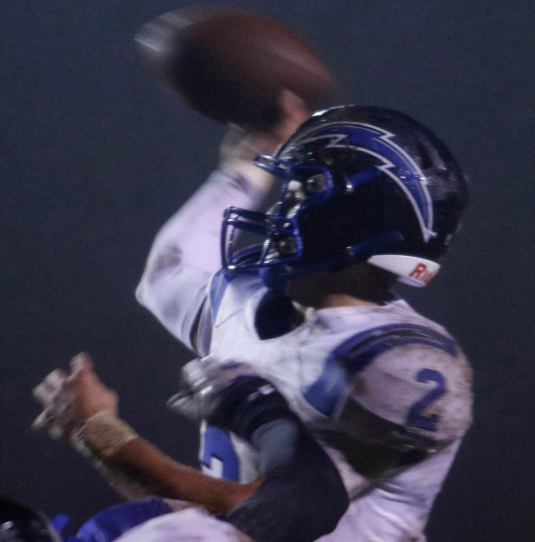 Dallas Christian quarterback Zack Hayland (2) launches a long pass during second quarter...