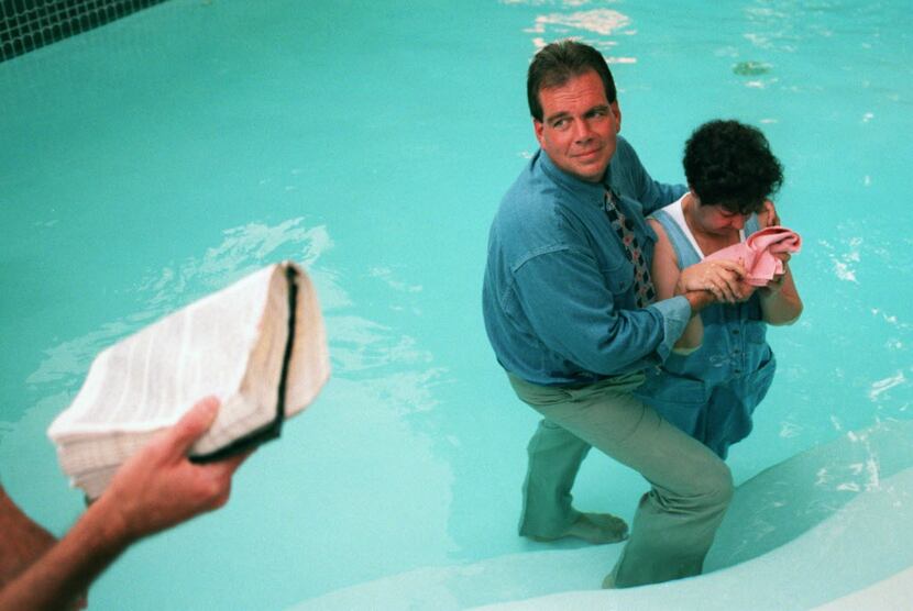 Flip Benham, director of Operation Rescue National, baptizes Norma McCorvey,  who was Roe in...