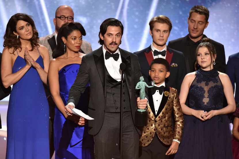 Milo Ventimiglia and the cast of This Is Us accept the award for outstanding performance by...