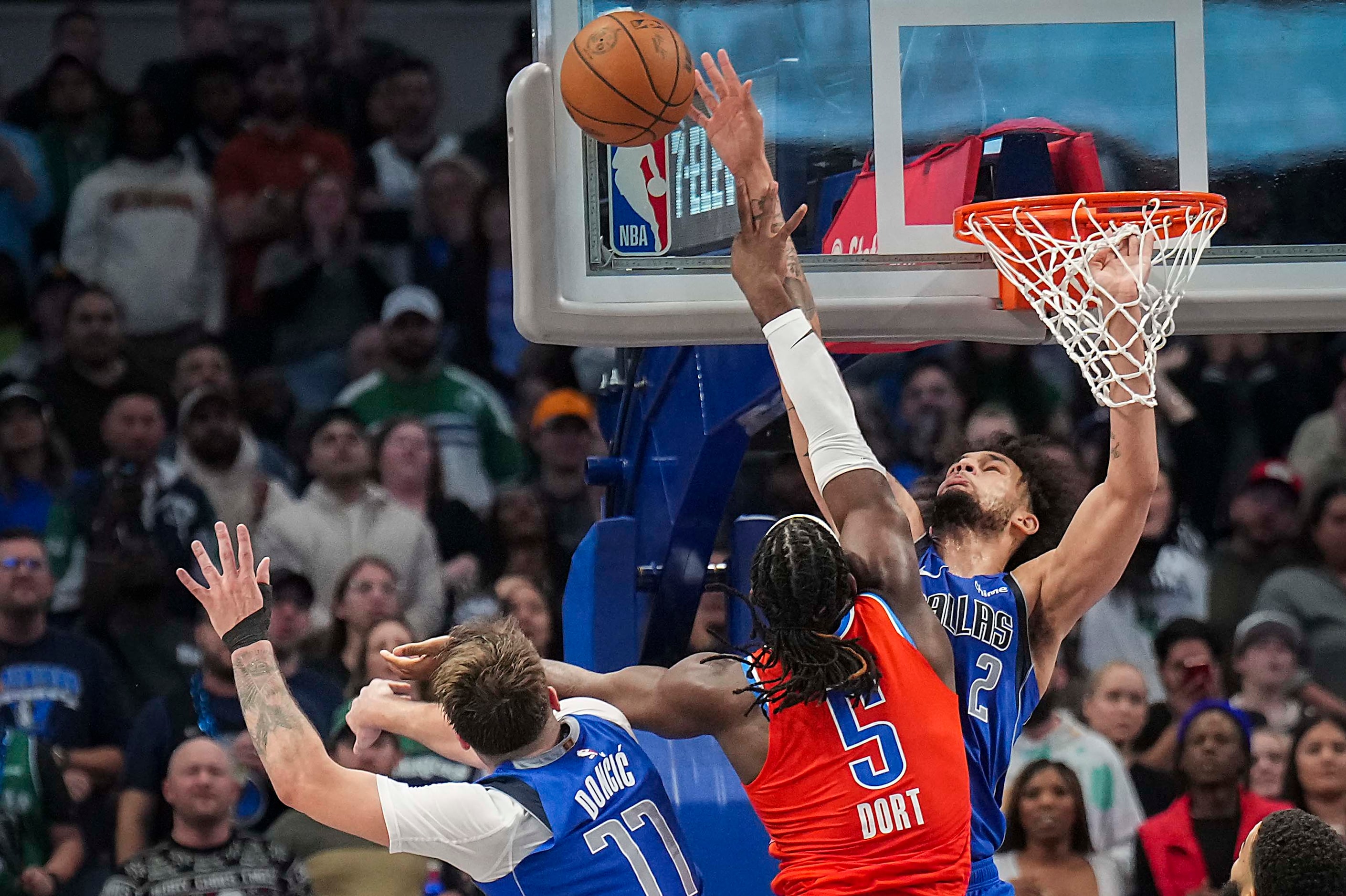 Dallas Mavericks center Dereck Lively II (2) blocks a shot by Oklahoma City Thunder guard...