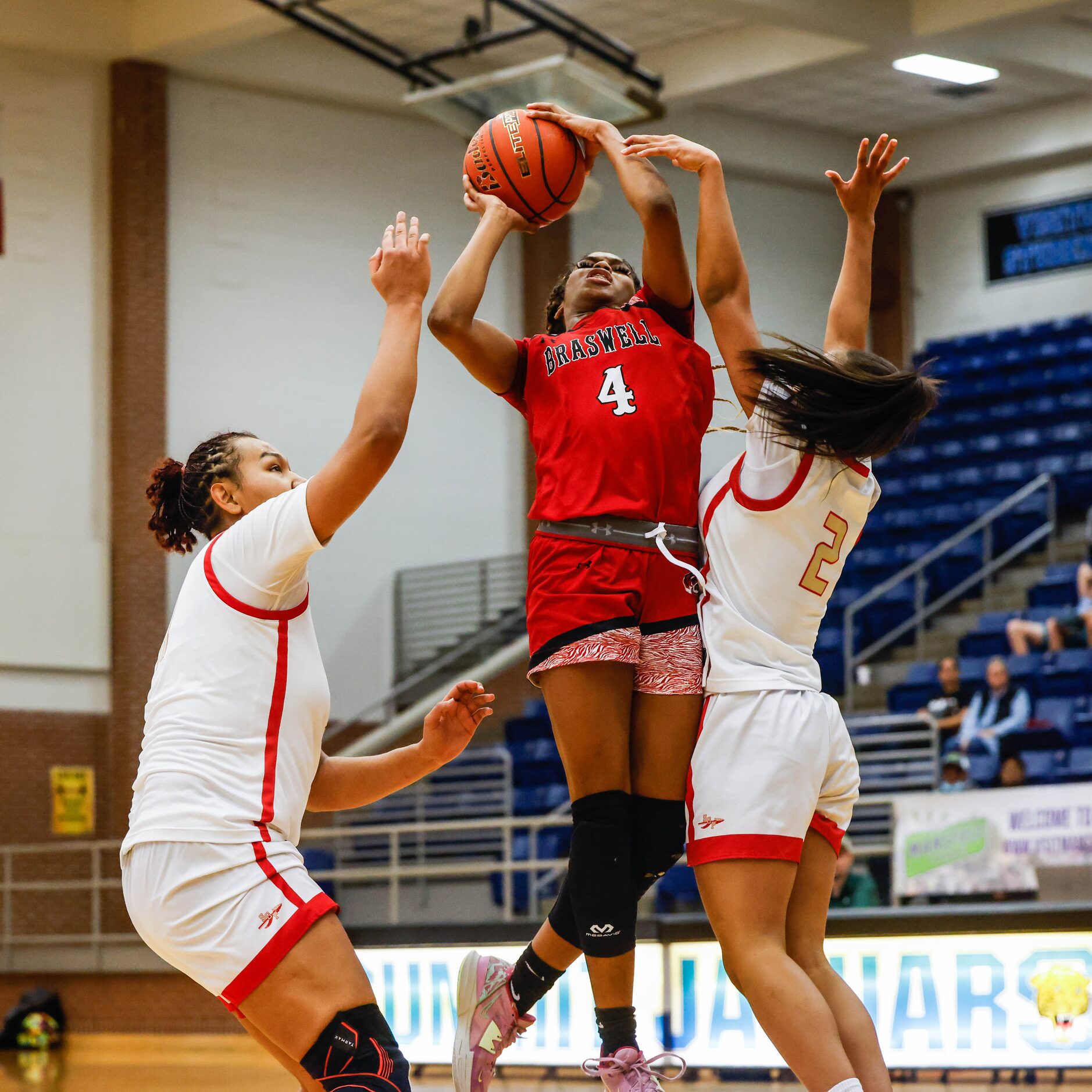 Denton Braswell's Kennedy Evans (4) goes for a shot against South Grand Prairie during the...