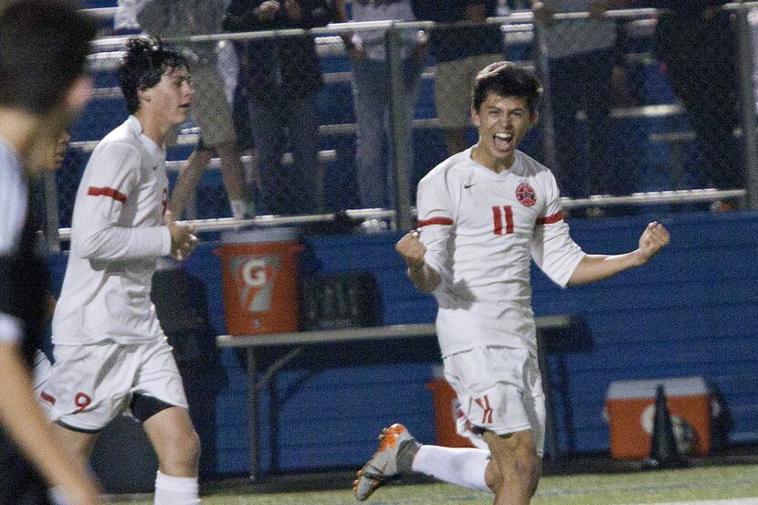Coppell player Nick Taylor (11) celebrates a goal against Lake Travis during their UIL 6A...