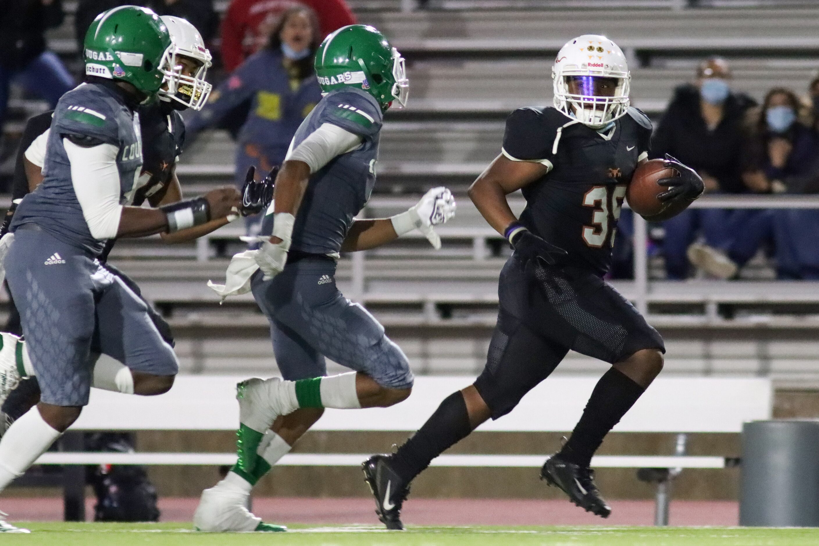 W.T. White running back Daviawn Bishop (35) runs past Bryan Adams defensive back Jordan...