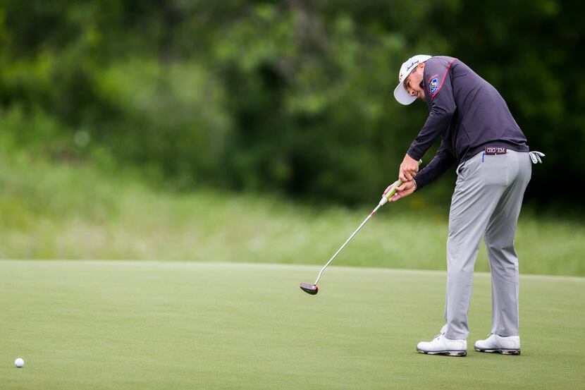 Ryan Palmer putts on the 15th green during round 2 of the AT&T Byron Nelson golf tournament...
