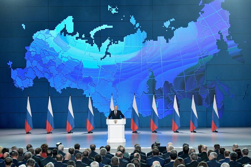 Russian President Vladimir Putin delivers a state-of-the-nation address in Moscow on Feb....