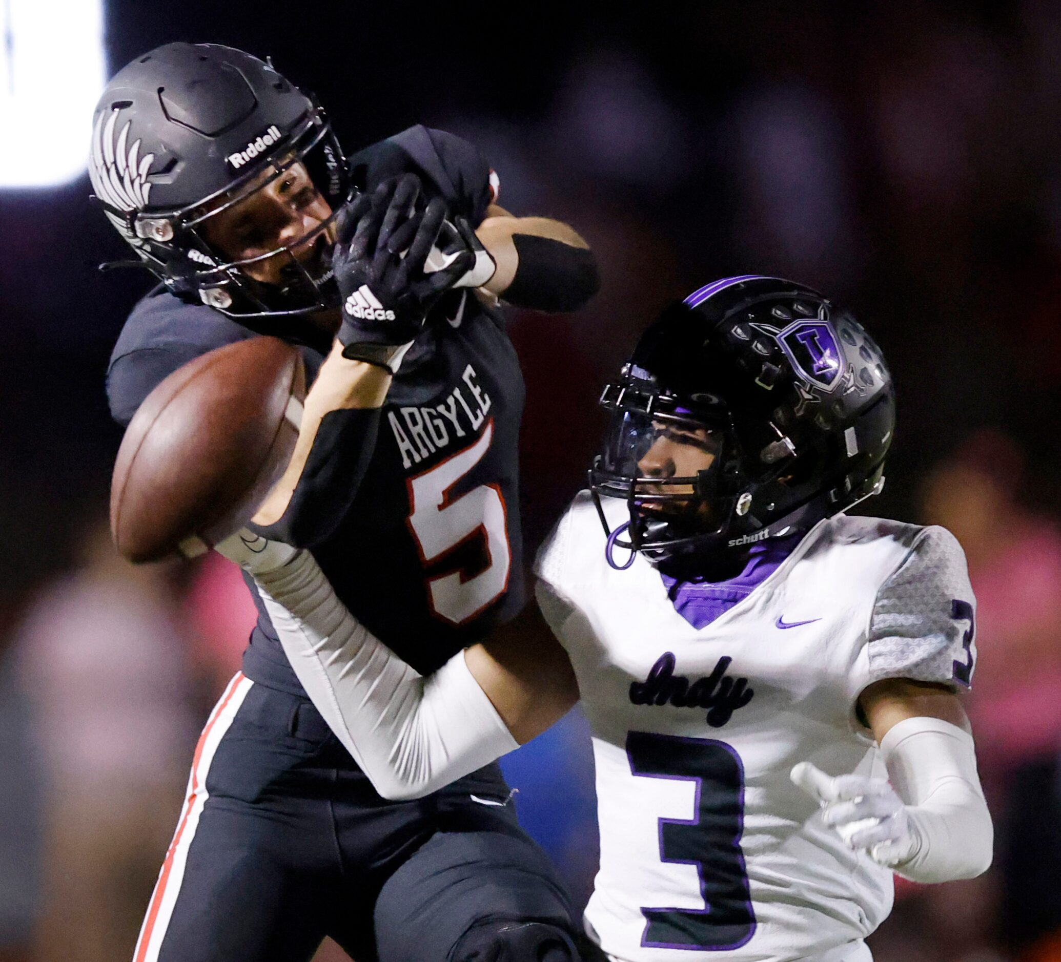 Frisco Independence defensive back Christian Gibson (3) keeps Argyle receiver Will Hodson...