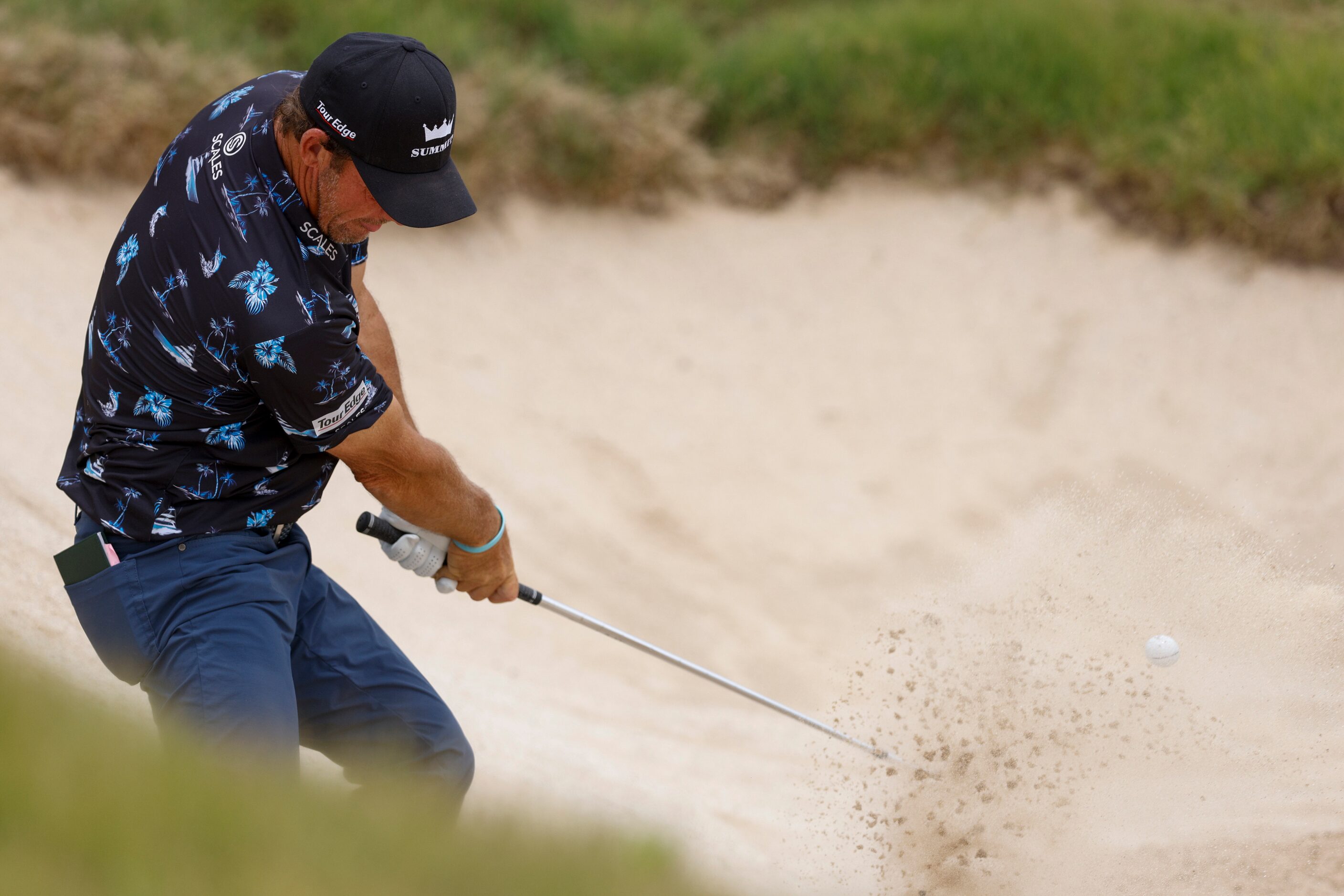 Alex Cejka of Germany hits out of a bunker on the 18th hole during the first round of the...