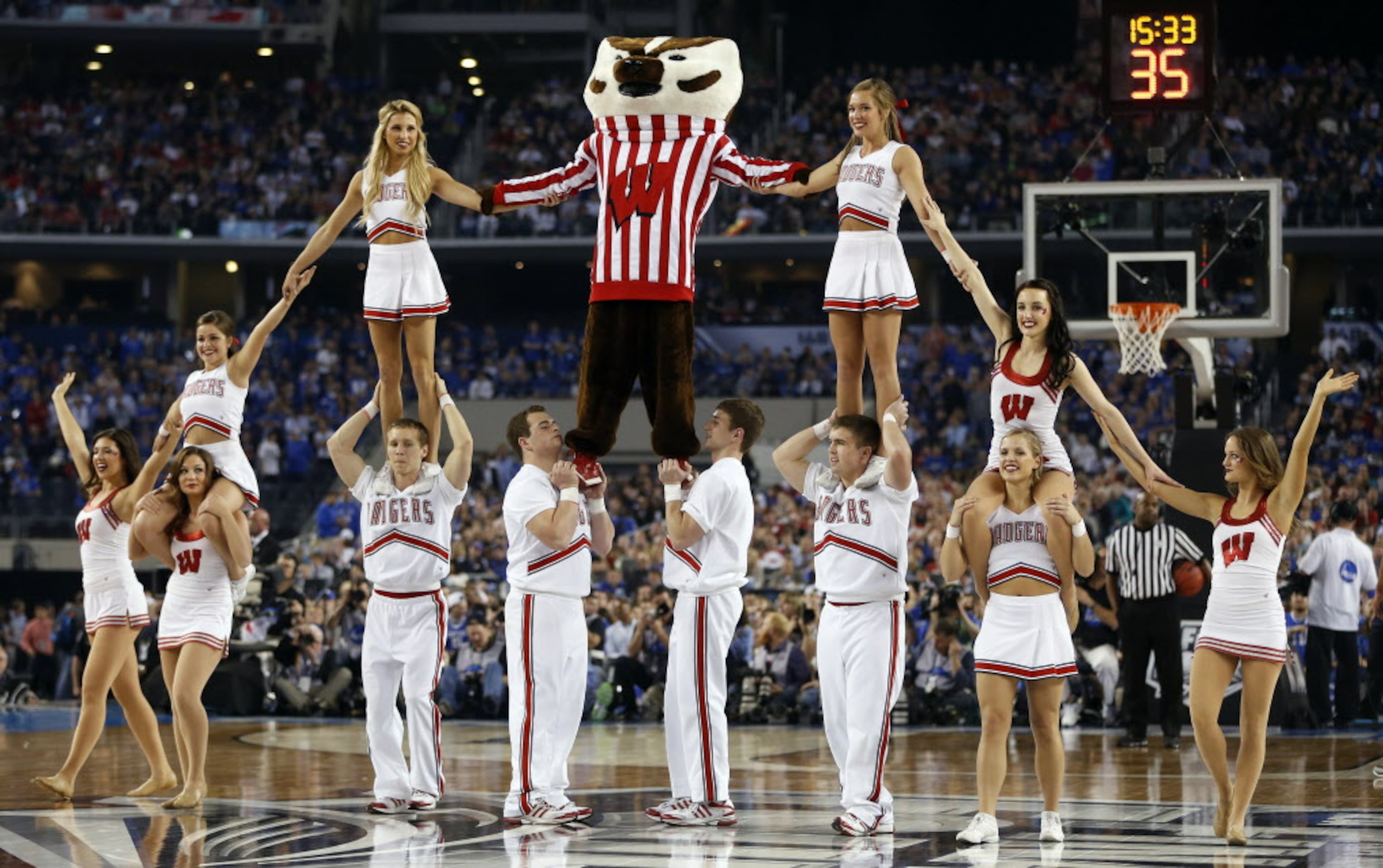 Wisconsin Badgers cheerleaders perform during a break in play in the second half of a...