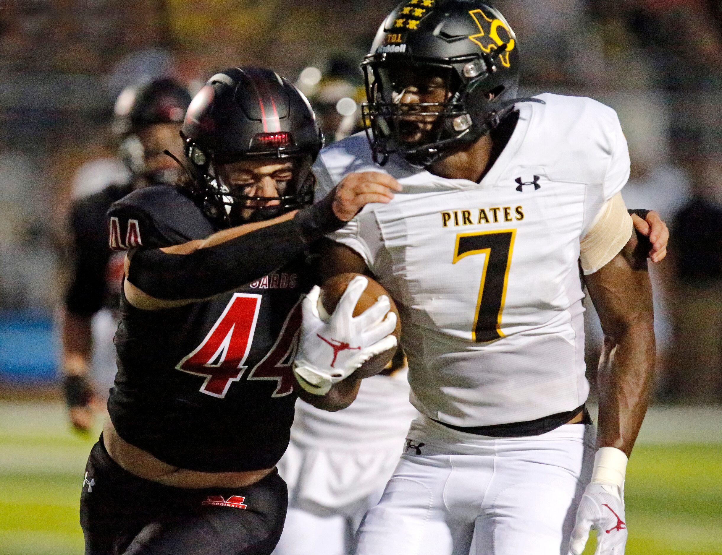 Melissa High School linebacker Alex Secreto (44) tackles Crandall High School wide receiver...