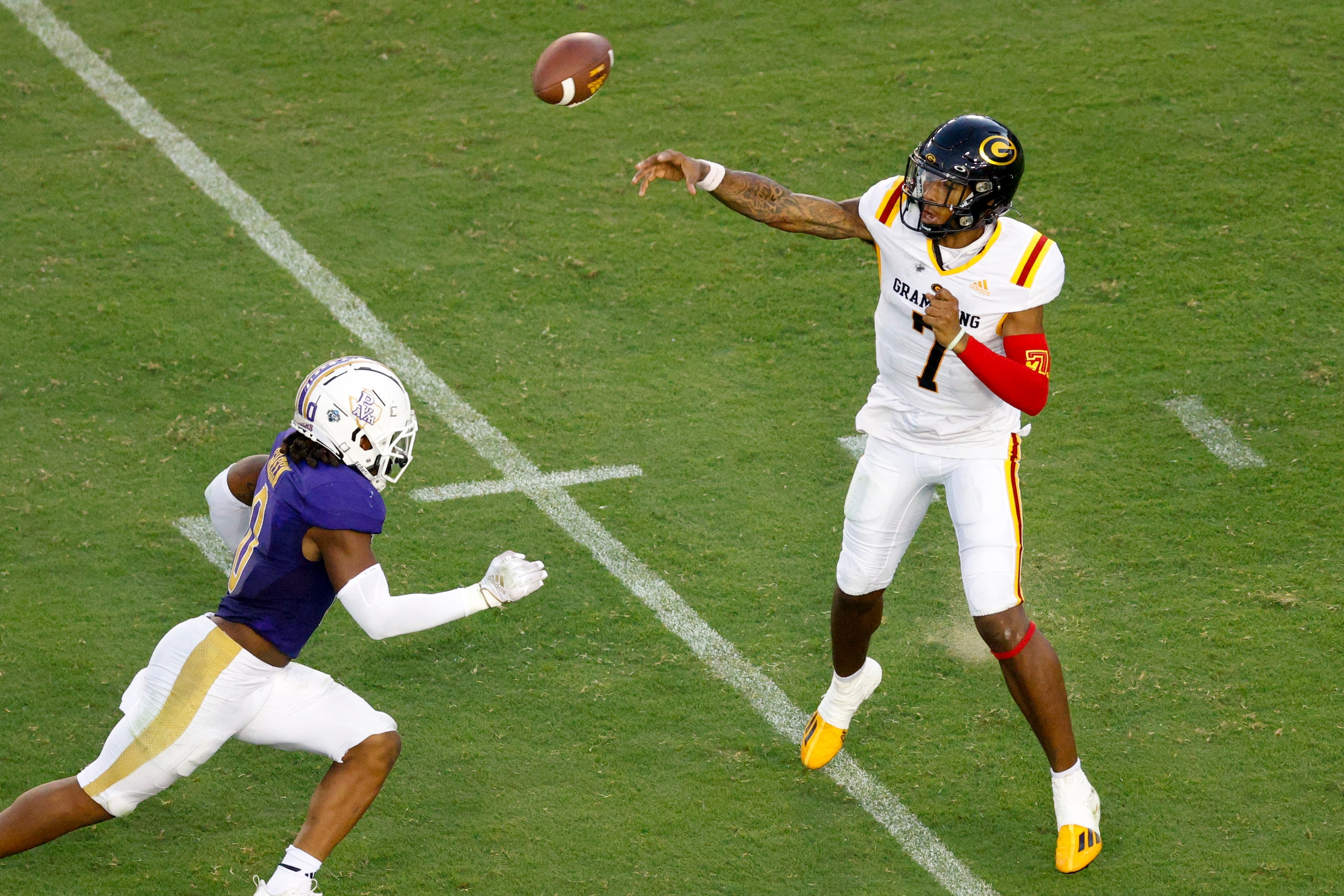 Grambling State quarterback Myles Crawley (7) throws a pass over Prairie View A&M linebacker...