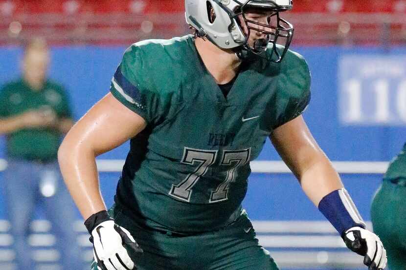 FILE - Reedy High School offensive lineman Nate Anderson looks for a block during the second...