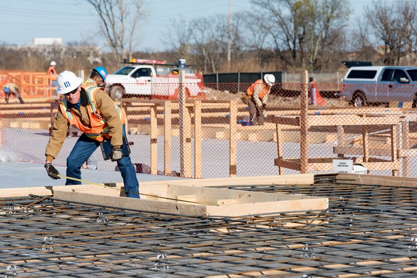 Construction worker working on build site for new North Texas Food Bank facility.