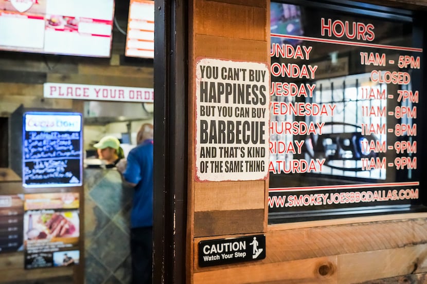 A customer places an order at Smokey Joe's BBQ on Thursday, March 9, 2023, in Dallas.